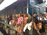 Riding the Train Through Dhaka