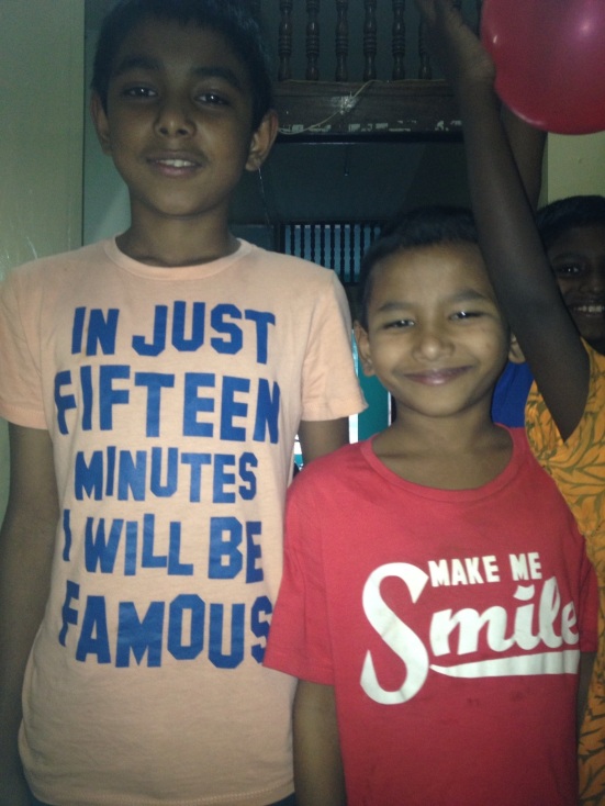 Kids from the shelter and their awesome tshirts!